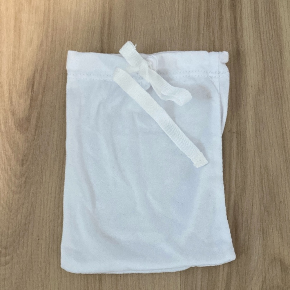 White drawstring bag